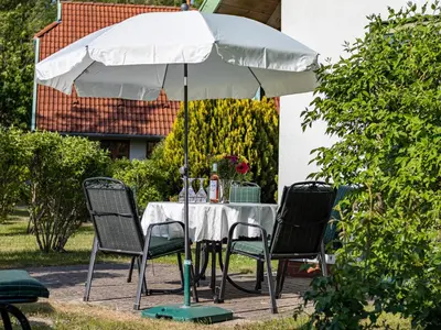 Ein Garten an der Unterkunft Ferienhaussiedlung Strandperlen Buchenhof 2c (Typ II)