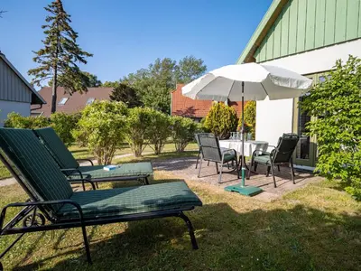 Ein Garten an der Unterkunft Ferienhaussiedlung Strandperlen Buchenhof 2c (Typ II)
