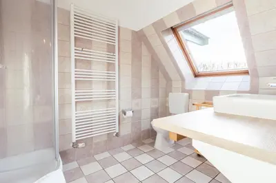 Ein Badezimmer in der Unterkunft Ferienhaussiedlung Strandperlen Buchenhof 2d (Typ I)