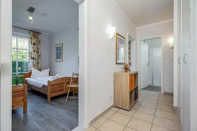 Ein Bett oder Betten in einem Zimmer der Unterkunft Strandoase Typ STO-A STRANDOASE Whg. SO2