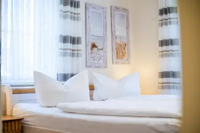 Ein Bett oder Betten in einem Zimmer der Unterkunft Strandoase Typ STO-A STRANDOASE Whg. SO5