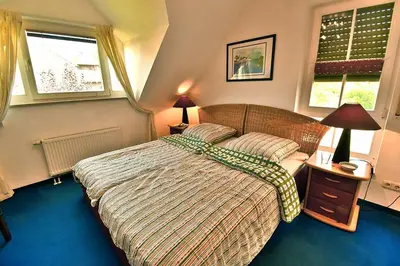 Ein Bett oder Betten in einem Zimmer der Unterkunft Strandoase Typ STO-A STRANDOASE Whg. SO8