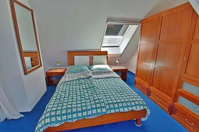 Ein Bett oder Betten in einem Zimmer der Unterkunft Strandoase Typ STO-A STRANDOASE Whg. SO8