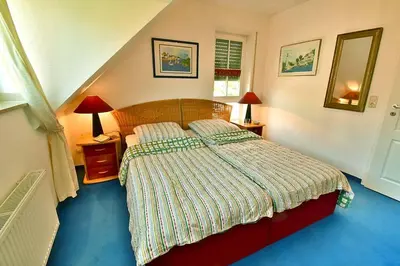 Ein Bett oder Betten in einem Zimmer der Unterkunft Strandoase Typ STO-A STRANDOASE Whg. SO8