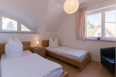 Ein Bett oder Betten in einem Zimmer der Unterkunft STRANDHAUS 43