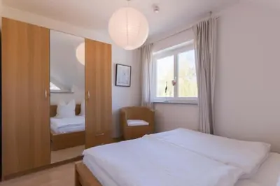 Ein Bett oder Betten in einem Zimmer der Unterkunft STRANDHAUS 43