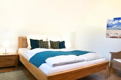 Ein Bett oder Betten in einem Zimmer der Unterkunft Fewo Amber Sonne