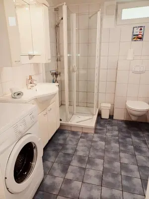Ein Badezimmer in der Unterkunft FeWo Leuchtturm - Heuser Prerow