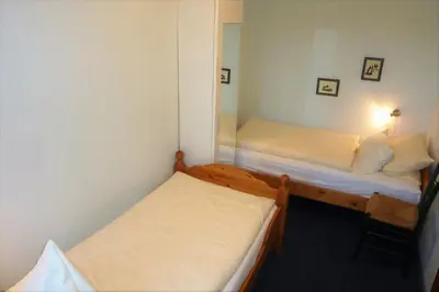 Ein Bett oder Betten in einem Zimmer der Unterkunft FeWo Eibe - Ulenhoef