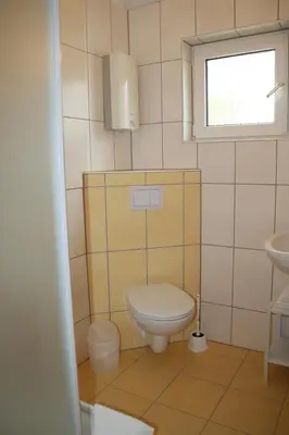 Ein Badezimmer in der Unterkunft FeWo Käuzchen - Ulenhoef
