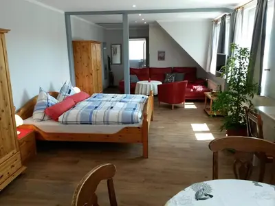 Ein Bett oder Betten in einem Zimmer der Unterkunft FeWo Weide - Ulenhoef