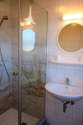Ein Badezimmer in der Unterkunft FeWo Weide - Ulenhoef
