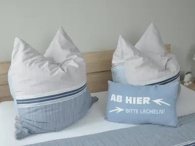 Ein Bett oder Betten in einem Zimmer der Unterkunft Whg 09 - Fischerstuv