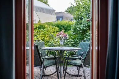 Ein Garten an der Unterkunft Ferienhaussiedlung Strandperlen Buchenhof 1a (Haustyp IV)