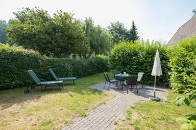 Ein Garten an der Unterkunft Ferienhaussiedlung Strandperlen Buchenhof 3b (Typ III)