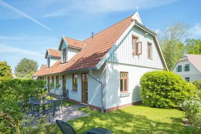 Ein Garten an der Unterkunft Ferienhaussiedlung Strandperlen Buchenhof 4d (Typ IV)