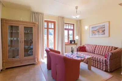 Ein Sitzbereich in der Unterkunft Ferienhaussiedlung Strandperlen Buchenhof 4d (Typ IV)