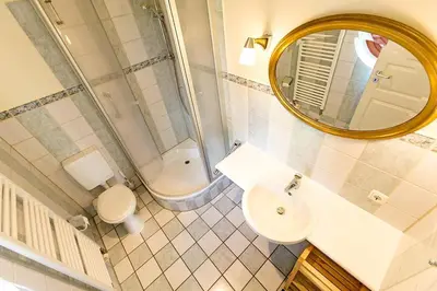 Ein Badezimmer in der Unterkunft Ferienhaussiedlung Strandperlen Buchenhof 5a (Typ IV)