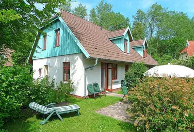 Ein Garten an der Unterkunft Ferienhaussiedlung Strandperlen Buchenhof 5a (Typ IV)