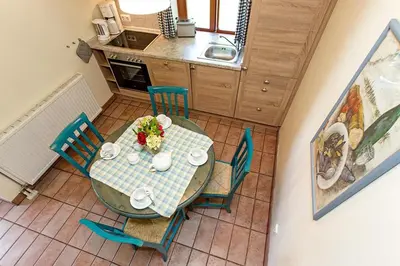 Küche/Küchenzeile in der Unterkunft Ferienhaussiedlung Strandperlen Buchenhof 5a (Typ IV)