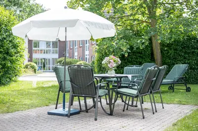 Ein Garten an der Unterkunft Ferienhaussiedlung Strandperlen Buchenhof 1b (Haustyp VI)