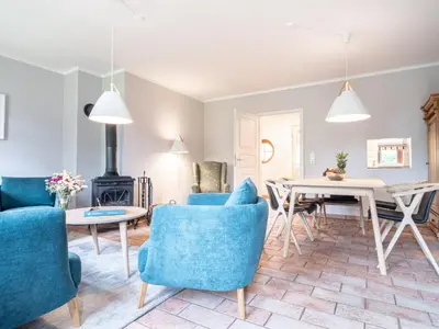Ein Sitzbereich in der Unterkunft Ferienhaussiedlung Strandperlen Buchenhof 1b (Haustyp VI)