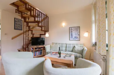 Ein Sitzbereich in der Unterkunft Ferienhaussiedlung Strandperlen Buchenhof 6b (Typ III)