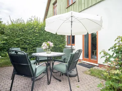 Ein Garten an der Unterkunft Ferienhaussiedlung Strandperlen Buchenhof 1c (Haustyp II)