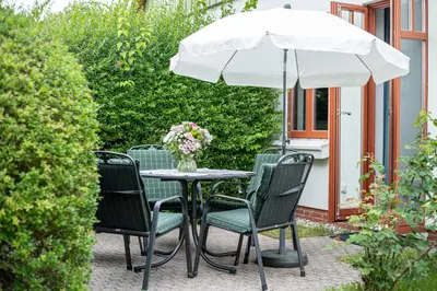 Ein Garten an der Unterkunft Ferienhaussiedlung Strandperlen Buchenhof 1c (Haustyp II)