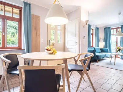 Ein Sitzbereich in der Unterkunft Ferienhaussiedlung Strandperlen Buchenhof 1c (Haustyp II)