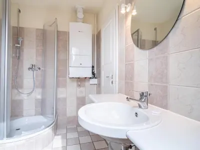 Ein Badezimmer in der Unterkunft Ferienhaussiedlung Strandperlen Buchenhof 1d (Haustyp I)