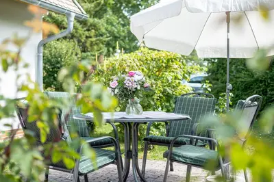 Ein Garten an der Unterkunft Ferienhaussiedlung Strandperlen Buchenhof 1d (Haustyp I)