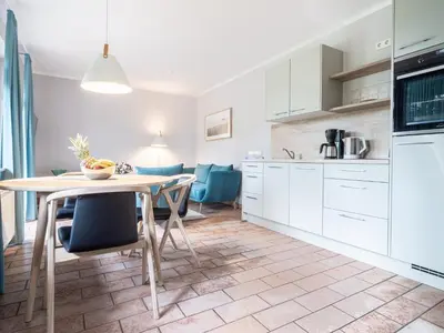 Küche/Küchenzeile in der Unterkunft Ferienhaussiedlung Strandperlen Buchenhof 1d (Haustyp I)