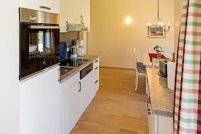 Küche/Küchenzeile in der Unterkunft Ferienhaussiedlung Strandperlen Weidenhof 6a (Typ VII)