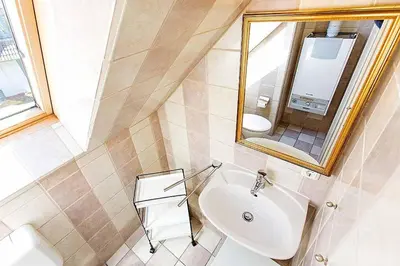 Ein Badezimmer in der Unterkunft Ferienhaussiedlung Strandperlen Weidenhof 6a (Typ VII)
