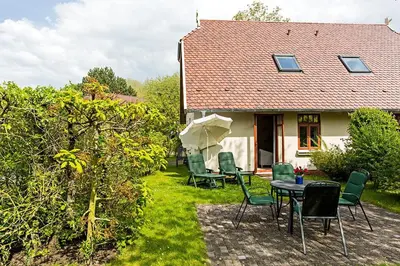 Ein Garten an der Unterkunft Ferienhaussiedlung Strandperlen Weidenhof 2a (Typ III)