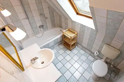 Ein Badezimmer in der Unterkunft Ferienhaussiedlung Strandperlen Weidenhof 2a (Typ III)
