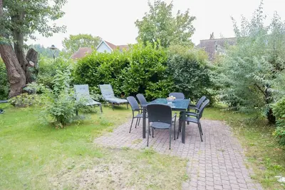 Ein Garten an der Unterkunft Ferienhaussiedlung Strandperlen Weidenhof 9a (Typ VII)