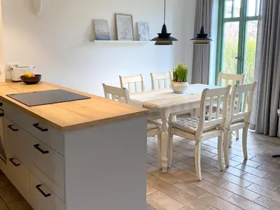 Küche/Küchenzeile in der Unterkunft Ferienhaussiedlung Strandperlen Weidenhof 3b (Typ VI)