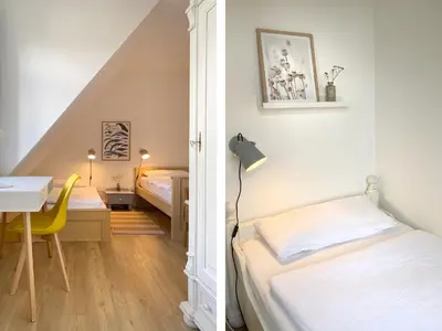 Ein Bett oder Betten in einem Zimmer der Unterkunft Ferienhaussiedlung Strandperlen Weidenhof 3b (Typ VI)