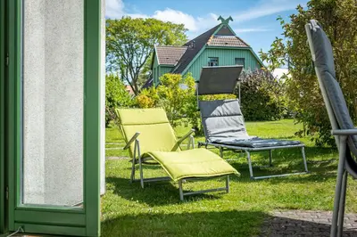 Ein Garten an der Unterkunft Ferienhaussiedlung Strandperlen Weidenhof 3c (Typ II)