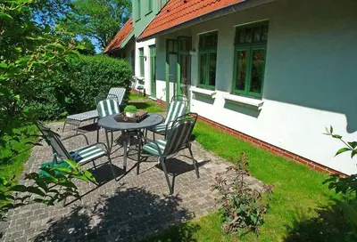 Ein Garten an der Unterkunft Ferienhaussiedlung Strandperlen Sanddornhof 3d (Typ I)