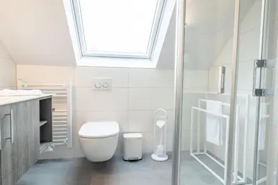 Ein Badezimmer in der Unterkunft Ferienhaussiedlung Strandperlen Sanddornhof 4b (Typ IX)