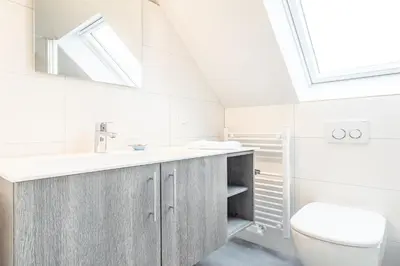 Ein Badezimmer in der Unterkunft Ferienhaussiedlung Strandperlen Sanddornhof 4b (Typ IX)