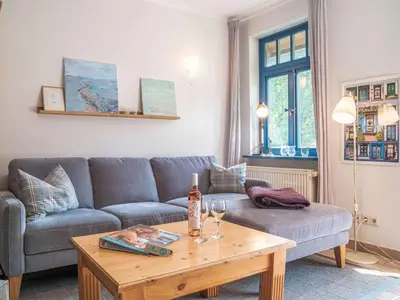 Ein Sitzbereich in der Unterkunft Ferienhaussiedlung Strandperlen Sanddornhof 5b (Typ V)