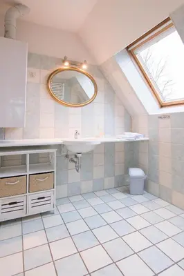 Ein Badezimmer in der Unterkunft Ferienhaussiedlung Strandperlen Sanddornhof 7a (Typ VIII)