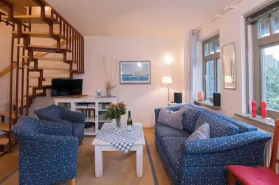Ein Sitzbereich in der Unterkunft Ferienhaussiedlung Strandperlen Sanddornhof 7a (Typ VIII)