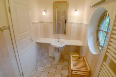 Ein Badezimmer in der Unterkunft Ferienhaussiedlung Strandperlen Sanddornhof 8b (Typ IX)