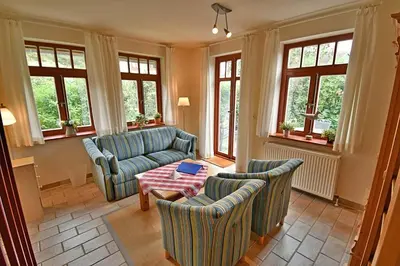 Ein Sitzbereich in der Unterkunft Ferienhaussiedlung Strandperlen Sanddornhof 2c (Typ II)