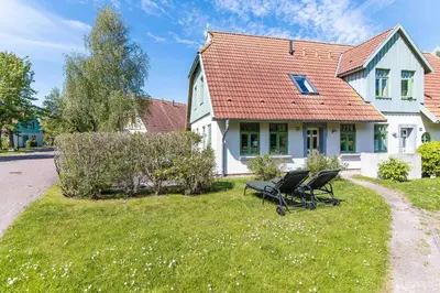 Ein Garten an der Unterkunft Ferienhaussiedlung Strandperlen Sanddornhof 3c (Typ II)